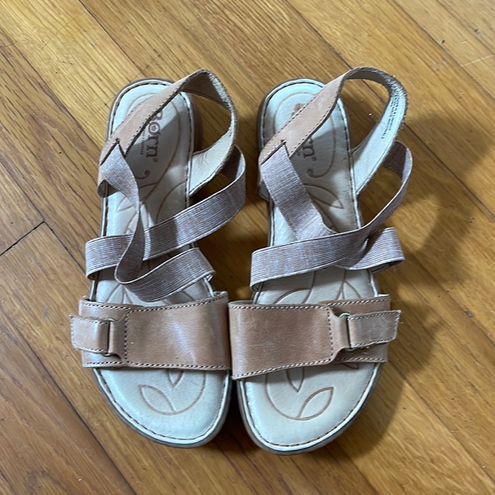 Born tan sandals with elastic cross strap/ rubber some. Hardly worn.